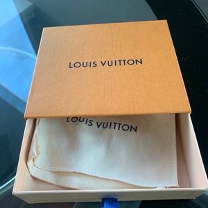 Empty Louis Vuttion box with dust bag